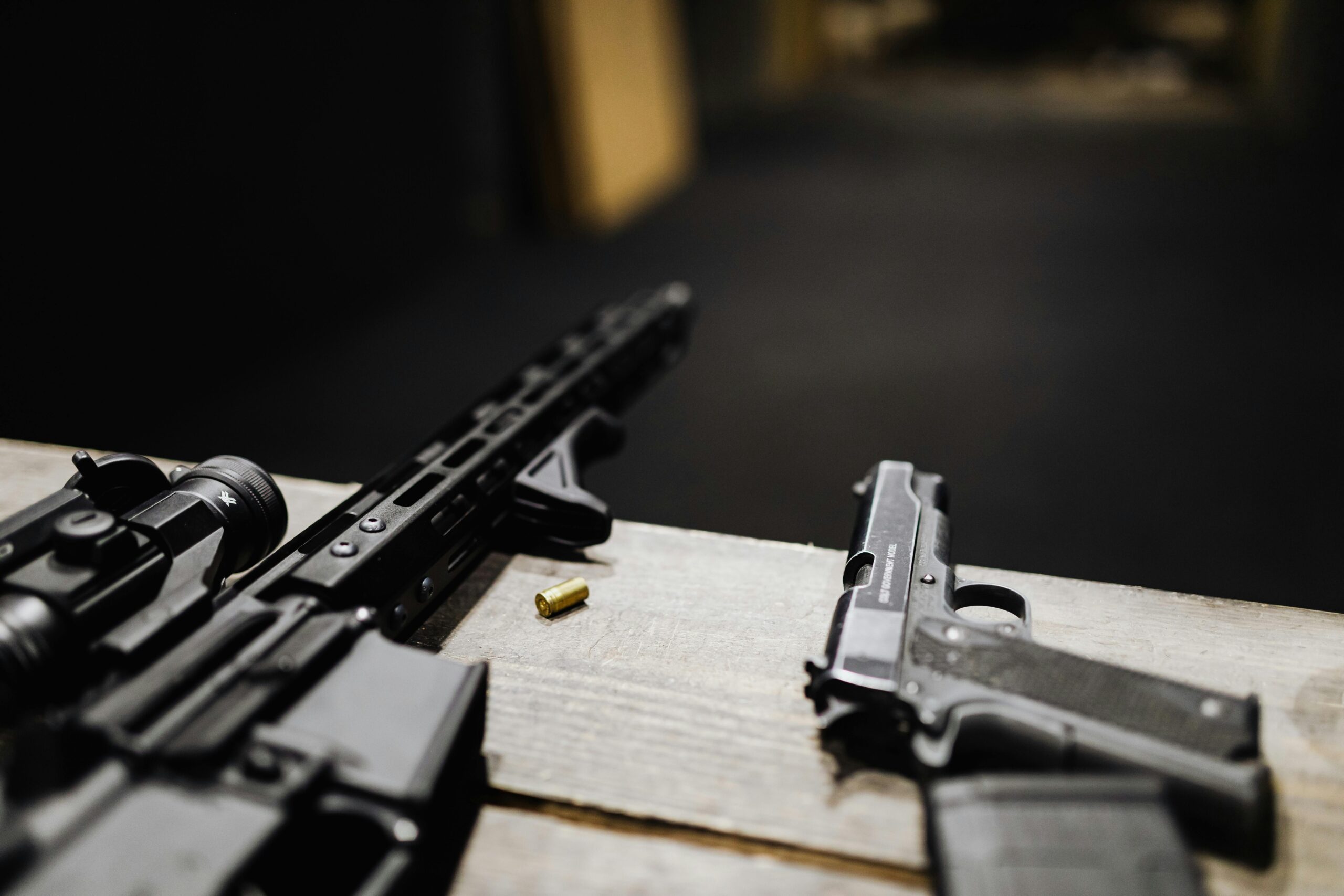 Guns on counter at indoor shooting range